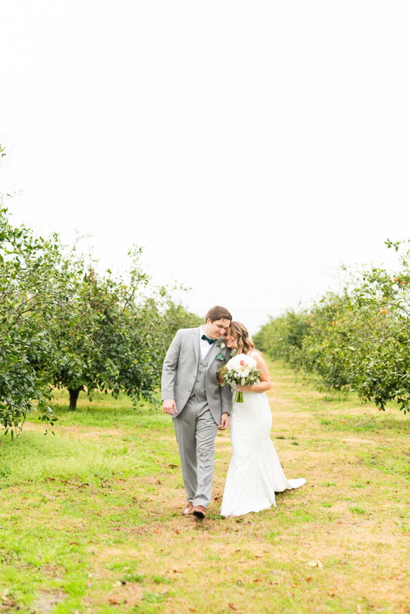 Trendy Intimate White and Green Orchard Wedding