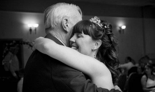 Bride And Father Dancing