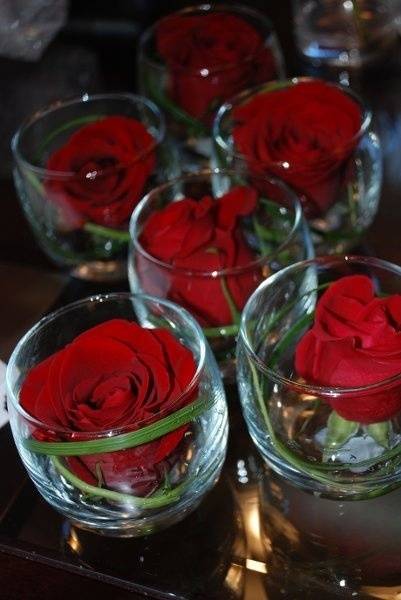 Red Roses in Glasses