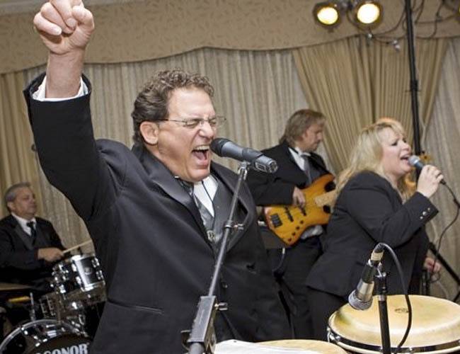 Choosing Your Wedding Music: Band or DJ?